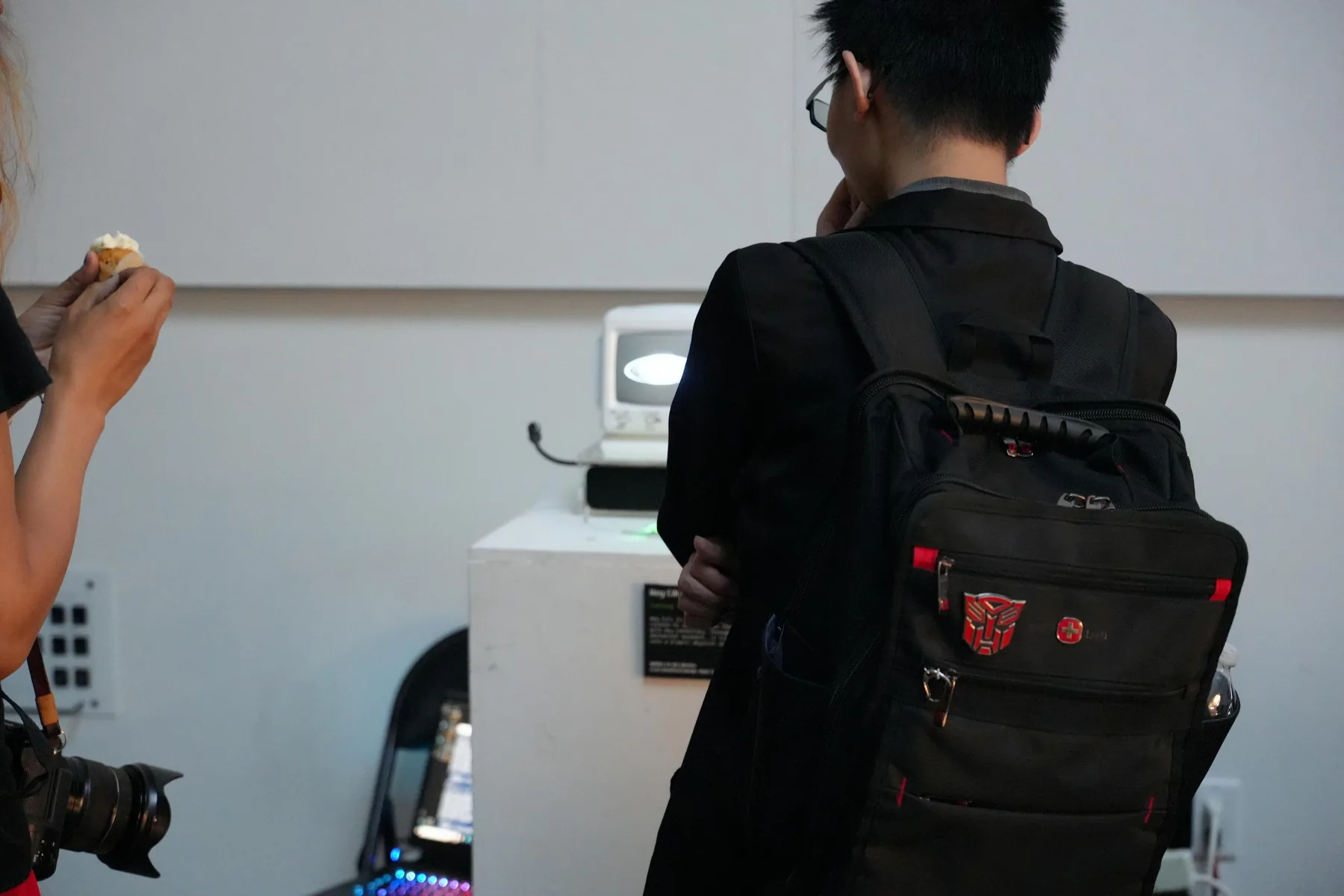 A visitor speaking to Hey, Cili during the exhibition
